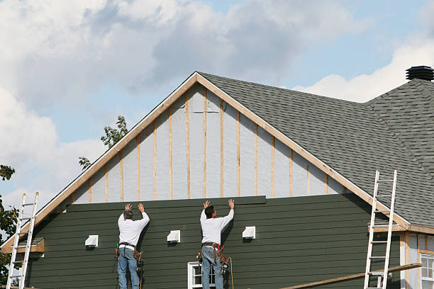 Professional Storm Damage Siding Repair technician working in Yorktown, TX